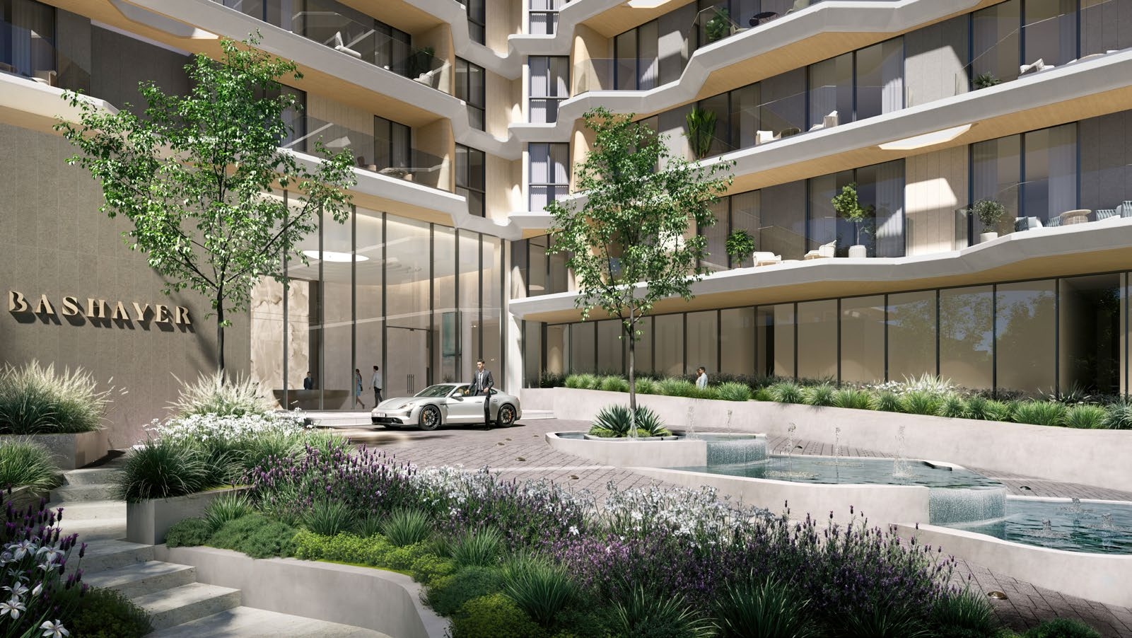 Bashayer Residences grand entrance with landscaped gardens and water features